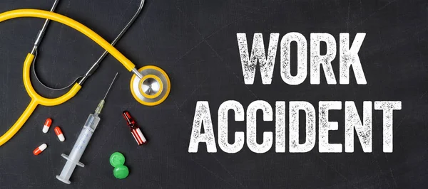 Stethoscope and pharmaceuticals on a blackboard - Work accident — Stock Photo, Image