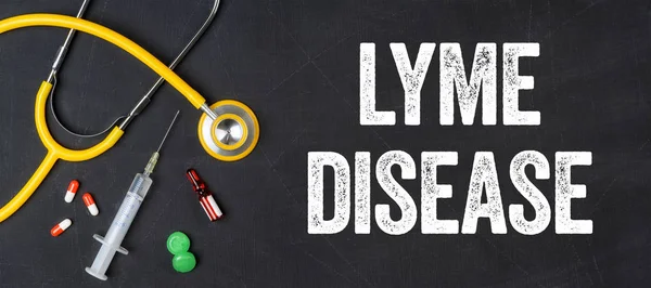 Στηθοσκόπιο και φαρμακευτικών προϊόντων σε έναν πίνακα - η νόσος του Lyme — Φωτογραφία Αρχείου