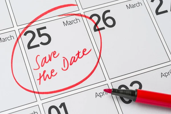 Save the Date written on a calendar - March 25 — Stock Photo, Image