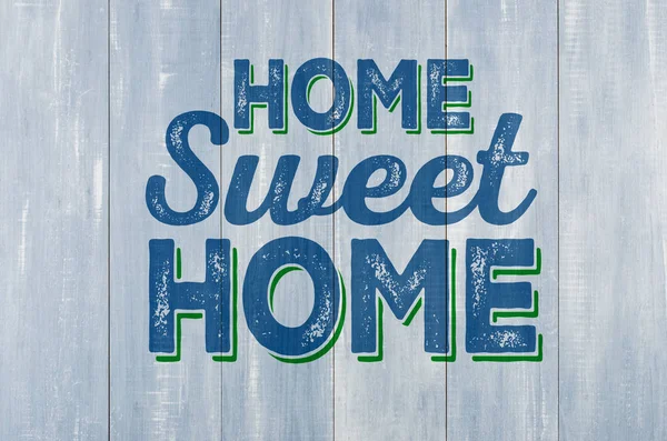 Μπλε ξύλινο τείχος με την επιγραφή σπίτι γλυκό σπίτι — Φωτογραφία Αρχείου