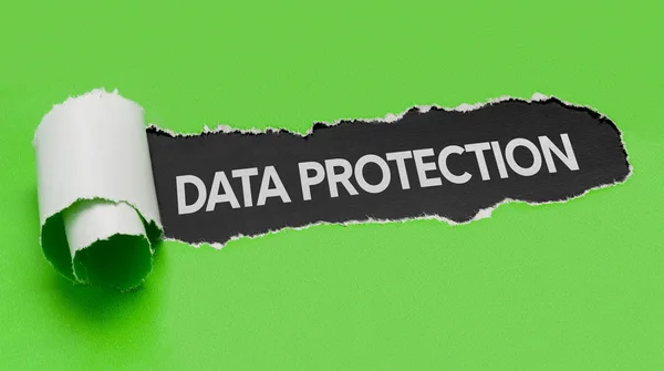 Torn green paper revealing the word Data Protection — Stock Photo, Image