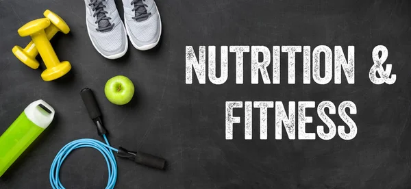Fitness equipment on a dark background - Nutrition and Fitness — Stock Photo, Image