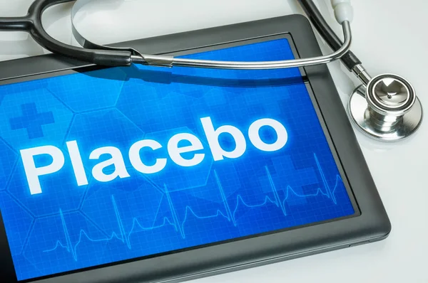 Tablet with the word Placebo on the display — Stock Photo, Image