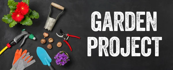 Garden tools on a dark background - Garden project — Stock Photo, Image