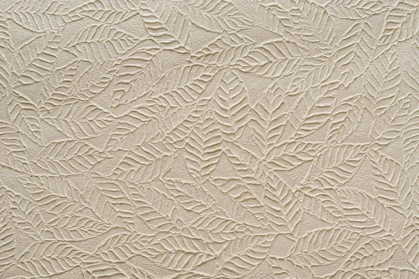Papier beige avec feuilles gaufrées — Photo