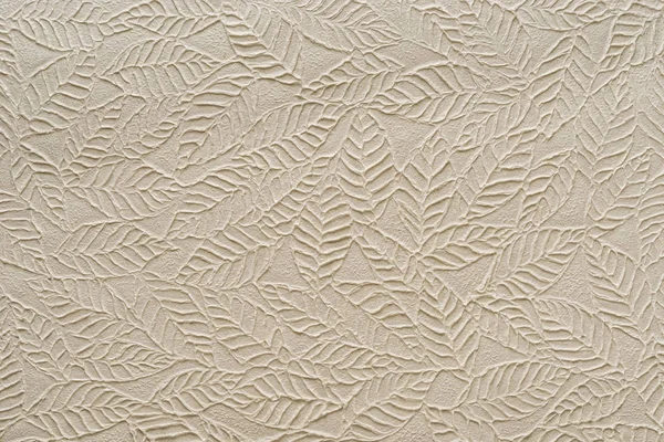 Papel beige con hojas en relieve —  Fotos de Stock