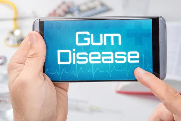 Smartphone avec le texte Gum Disease sur l'écran — Photo