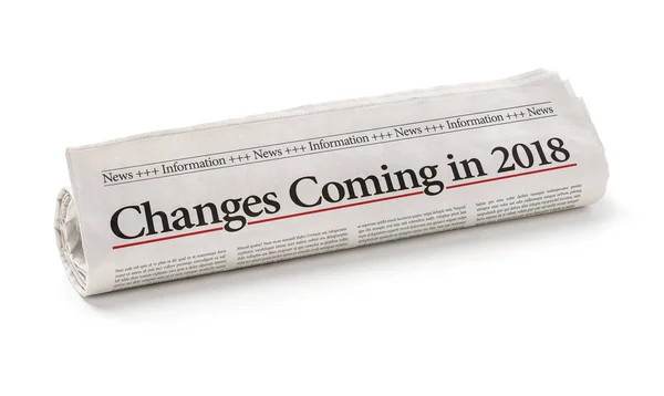 Rolled newspaper with the headline Changes coming in 2018 — Stock Photo, Image