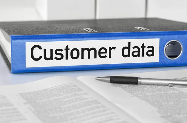 Müşteri veri etiketi ile mavi bir klasör — Stok fotoğraf