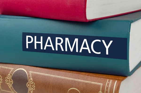 A book with the title Pharmacy written on the spine — Stock Photo, Image