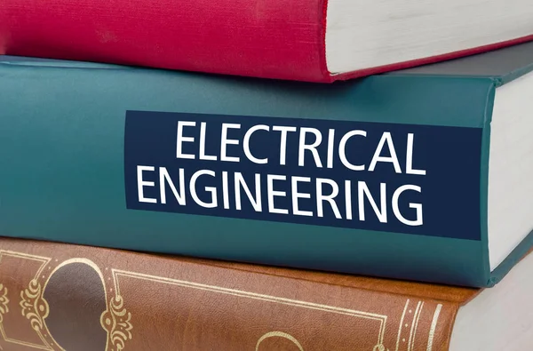 Um livro com o título Electric Engeneering escrito no spin — Fotografia de Stock