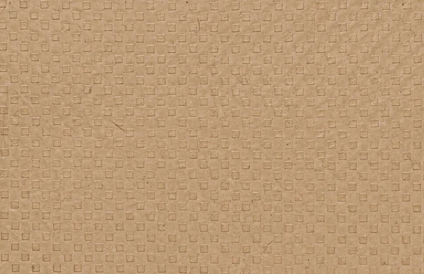 Brown paper with embossed squares — Stock Photo, Image