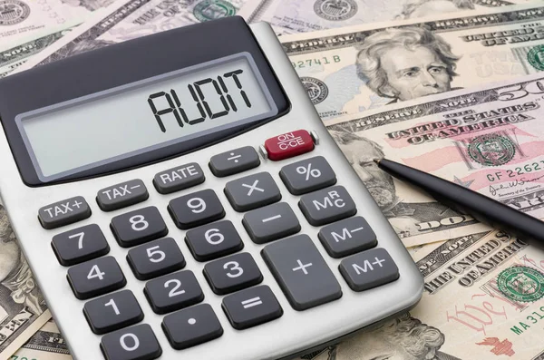 Calculator met dollarbiljetten - Audit — Stockfoto