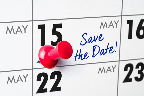 Wall calendar with a red pin - May 15
