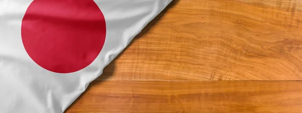 Bandera nacional de Japón sobre fondo de madera con espacio para copiar — Foto de Stock