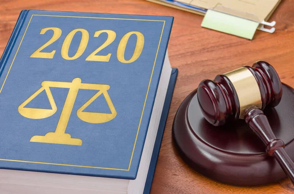 Law book with a gavel - 2020 — Stock Photo, Image