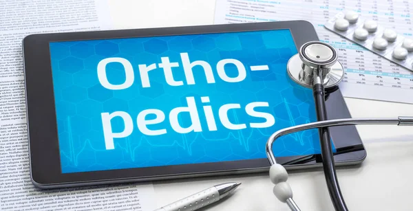 Le mot Orthopédie sur l'affichage d'une tablette — Photo