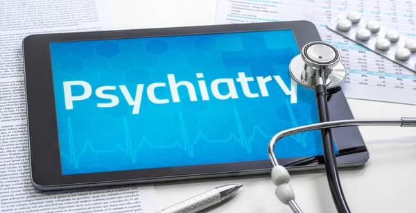 The word Psychiatry on the display of a tablet — Stock Photo, Image