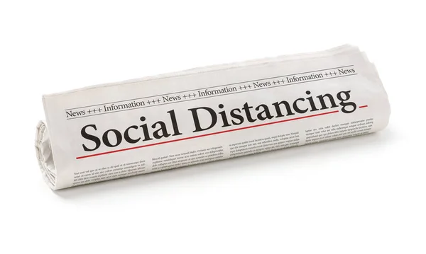 Periódico Enrollado Con Titular Social Distancing — Foto de Stock