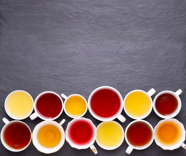 Assortment Tea Cups Dark Stone Background Top View Copy Space — Stock Photo, Image