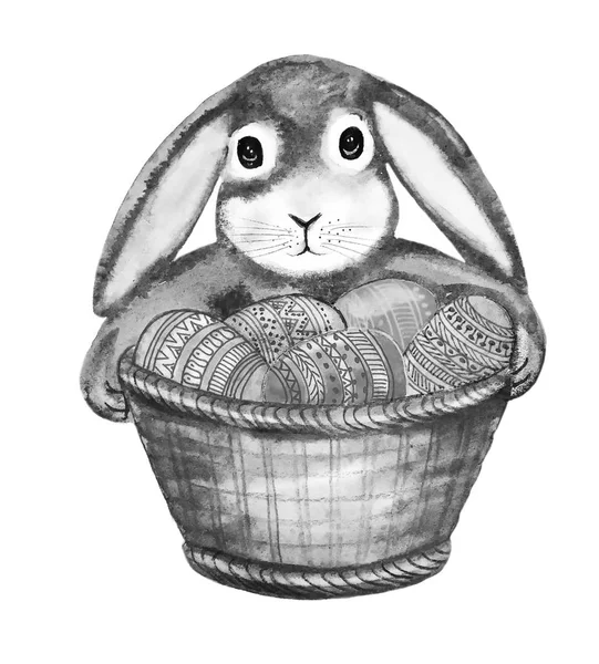 ön bacaklar beyaz izole bir şekilde dekore edilmiş Paskalya yumurta suluboya bir dekoratif sepet ile tutarak siyah-beyaz lop-eared Bunny