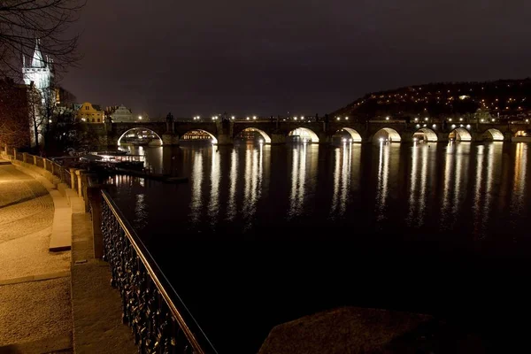 Night View of Old Town Bridge Tower and Charles Bridge in Prague, Czech Republic