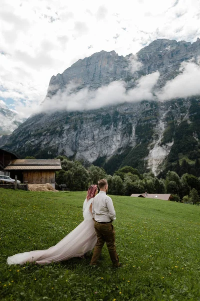Young Bride Groom Walking Green Mountain Meadow Clouds Alps — Stock Photo, Image
