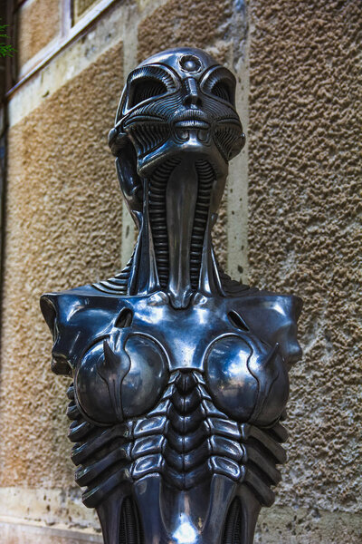 statue of HR Giger cafe with his biomechanical style