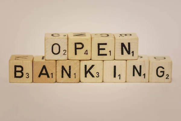Closeup of word Open Banking on wooden blocks, background concept