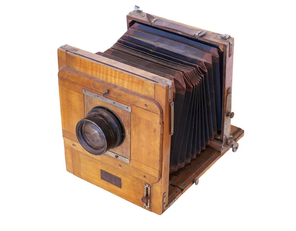 Old vintage wooden camera with lens Stock Photo