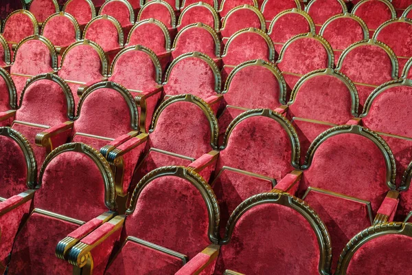 Empty vintage red wooden and velvet chairs — ストック写真