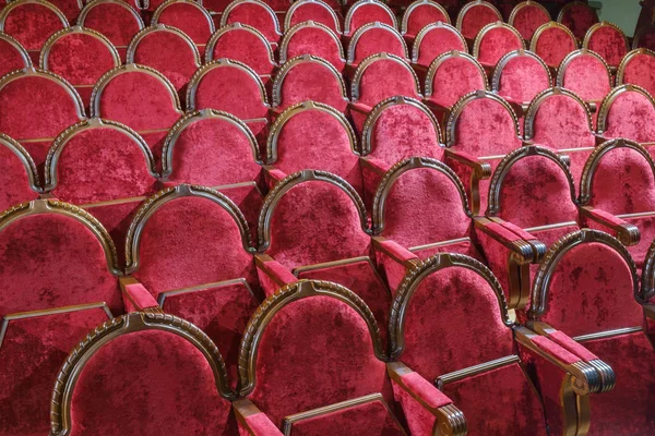 Empty vintage red wooden and velvet chairs — ストック写真