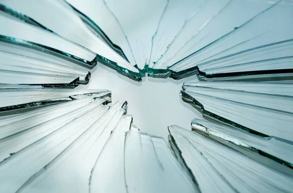 Broken and cracked glass with hole — Stock Photo, Image
