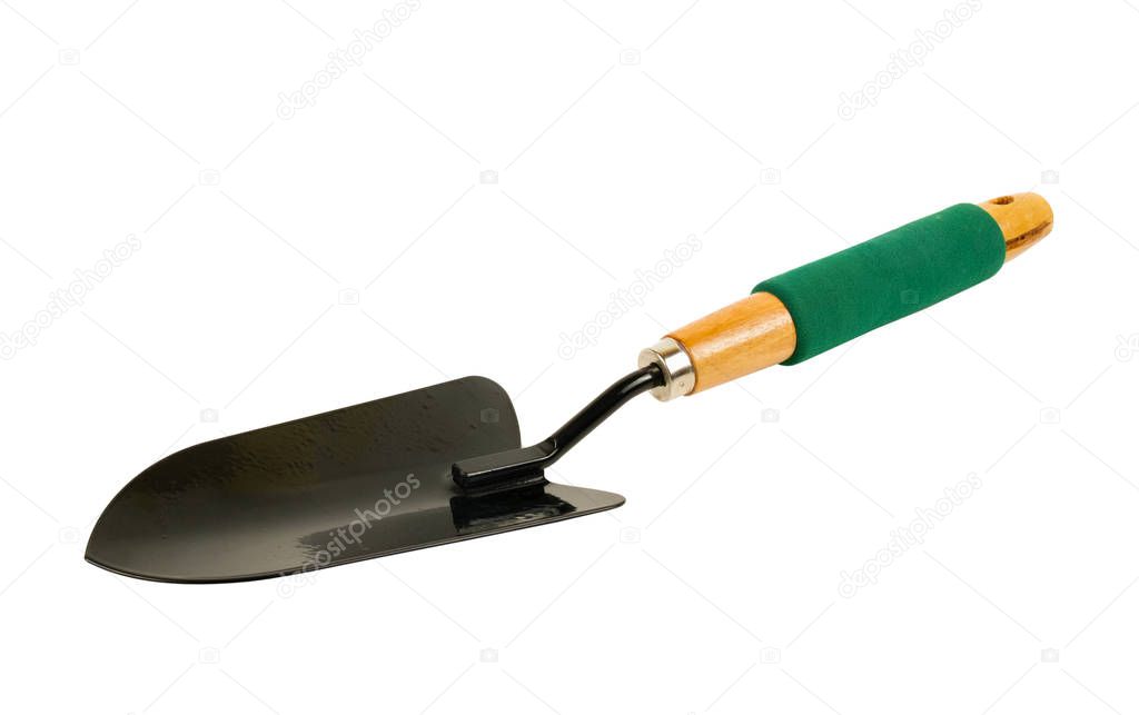 Black shovel with green handle