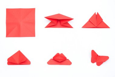 Beyaz arkaplanda origami kelebeği yapma adımları