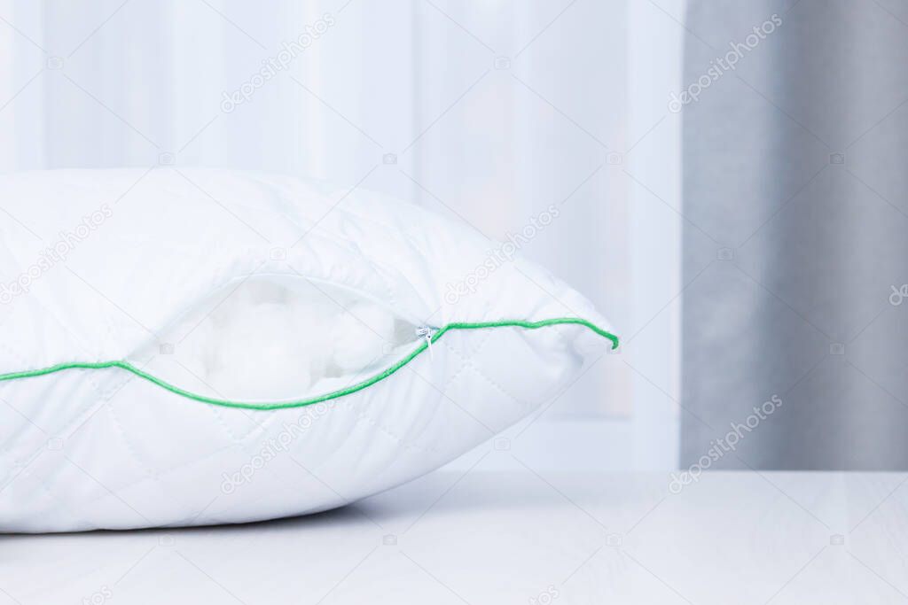 Hypoallergenic pillow with tinsulate or polyester filler. Allergy dust concept.
