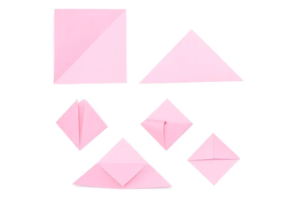 Steps of making origami bookmark on white background. DIY concept.
