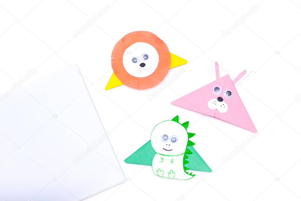 Cute animals origami paper corner bookmarks on white background.