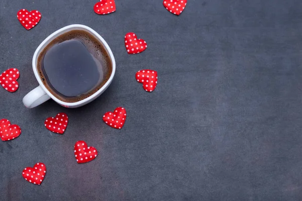 Cup of black coffee for father, hearts on black background. I love you DAD concept. Flat lay, copy space.