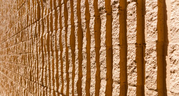 Fondo de pared de piedra naranja — Foto de Stock