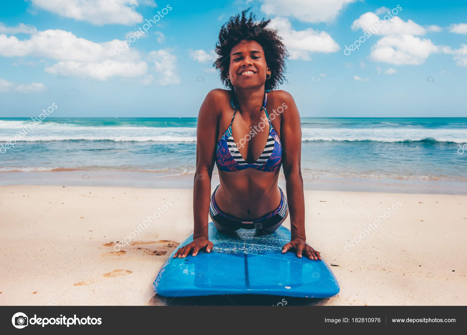 Surfer Girl Afro Hairstyle Smiling Lying Blue Surfboard White Sand Stock Photo by © 182810976 Surfer Girl Afro Hairstyle Smiling Lying Blue Surfboard White Sand Stock Photo by © 182810976