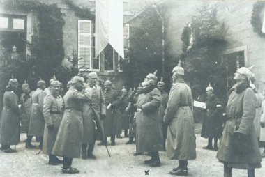 High ranking german officer at inspection of troops in court of staff building clipart
