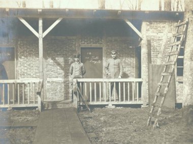 two german Lieutenants in front of accommodation clipart