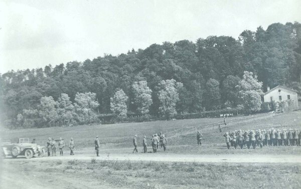 german unit standing attention for welcoming high ranking officer