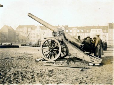 heavy field canon with german soldiers at towns court clipart