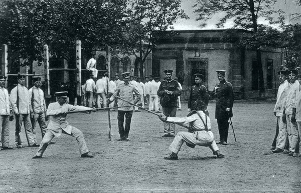 German recruits at close combat training with pikes in caserne
