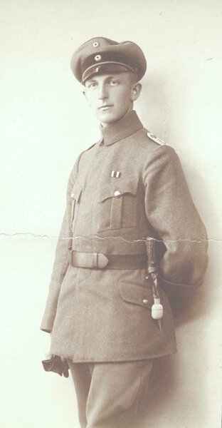 german officer posing for photographer in studio