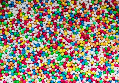 Yuvarlak ve renkli dekoratif bezelye arka yüzey