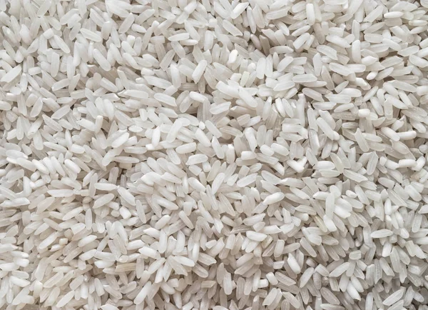 Pile of White Rice Background Surface Texture