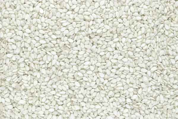 Superficie de fondo de semillas de sésamo blanco con espacio libre —  Fotos de Stock